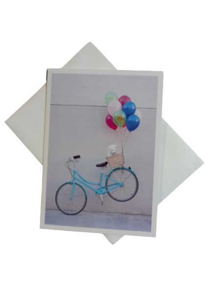 Kaart met fiets en ballonnen